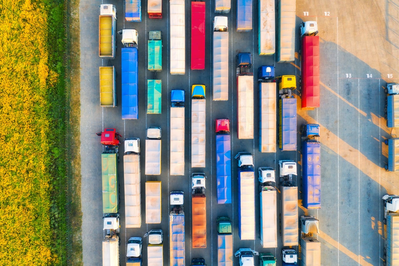 Aerial view of rows of trailers parked at a haulage depot